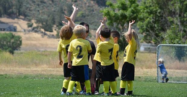 Kids huddle soccer